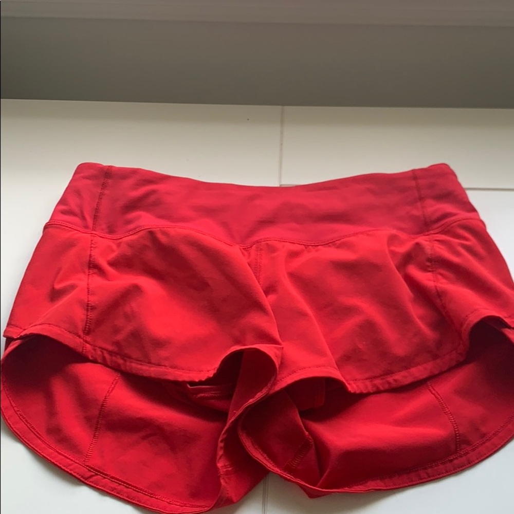 red lululemon shorts
